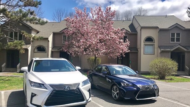 Two Lexus cars parked in a lot with a building in the background. - Whitetail Retreat-Hiking, Biking & River adventure (East Stroudsburg)