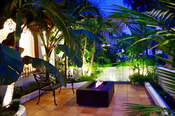 Front patio: fire pit, old Spanish fountain. More seating avail. Steps to beach.
