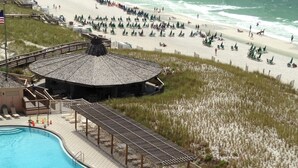 A pool area with a view of the beach and ocean. - Wow!!! Updated Beach Front Resort 3rd Fl Condo with amazing view. (Destin)