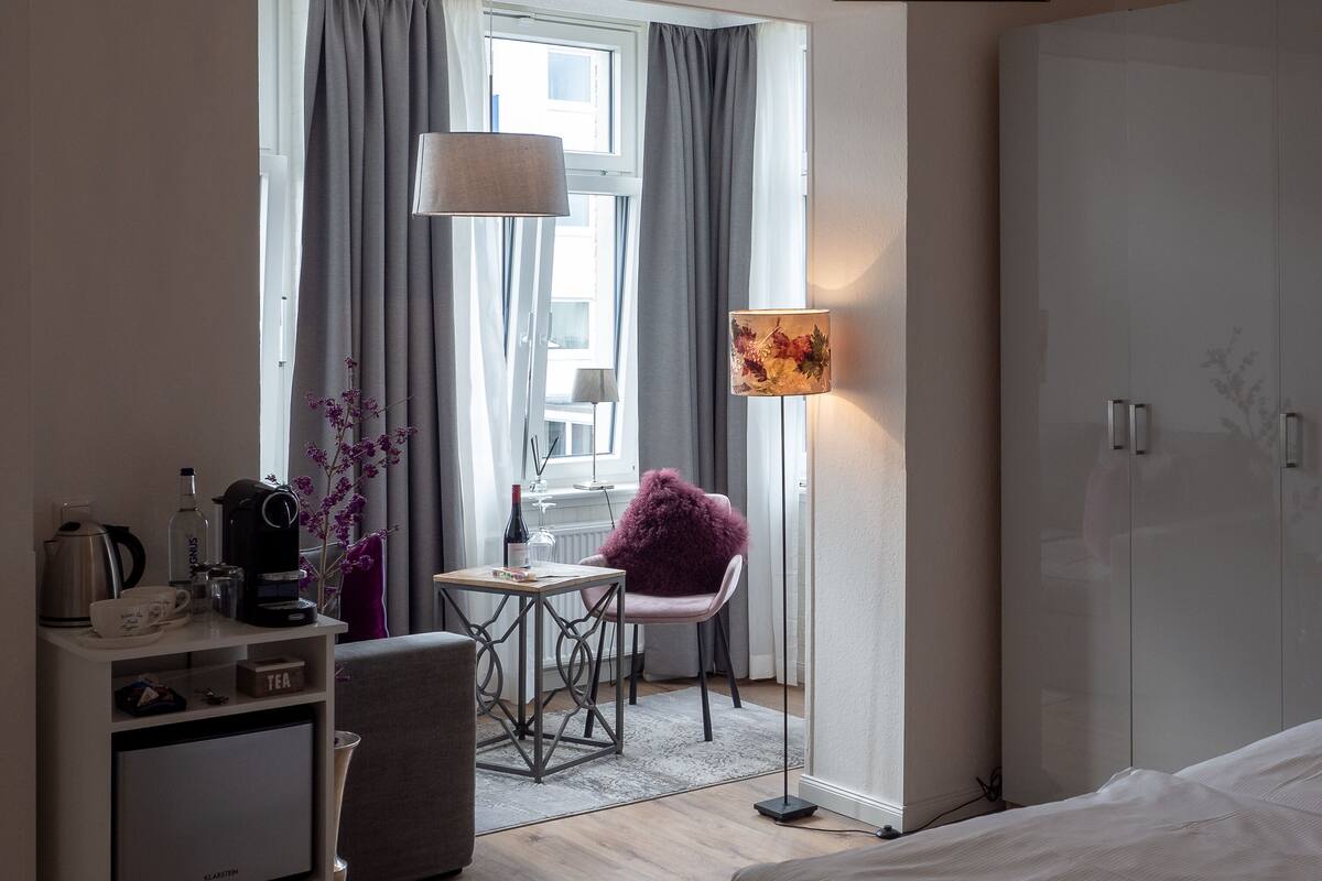 deluxe double room | living area | smart tv