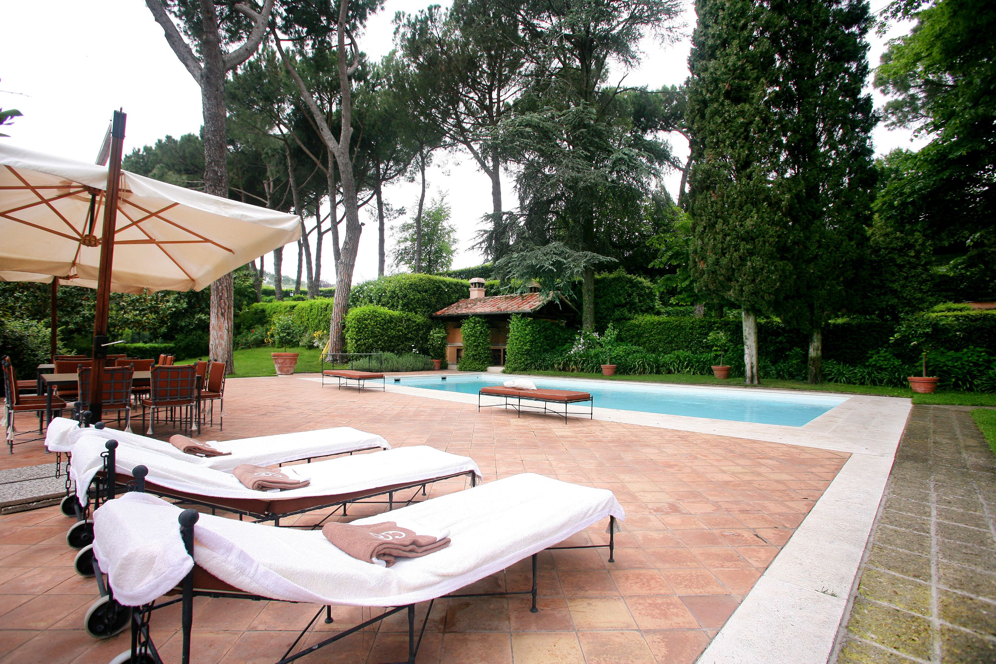 Seasonal outdoor pool, open 9 AM to 7 PM, pool umbrellas, sun loungers