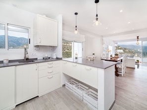 Microwave, dishwasher, dining tables