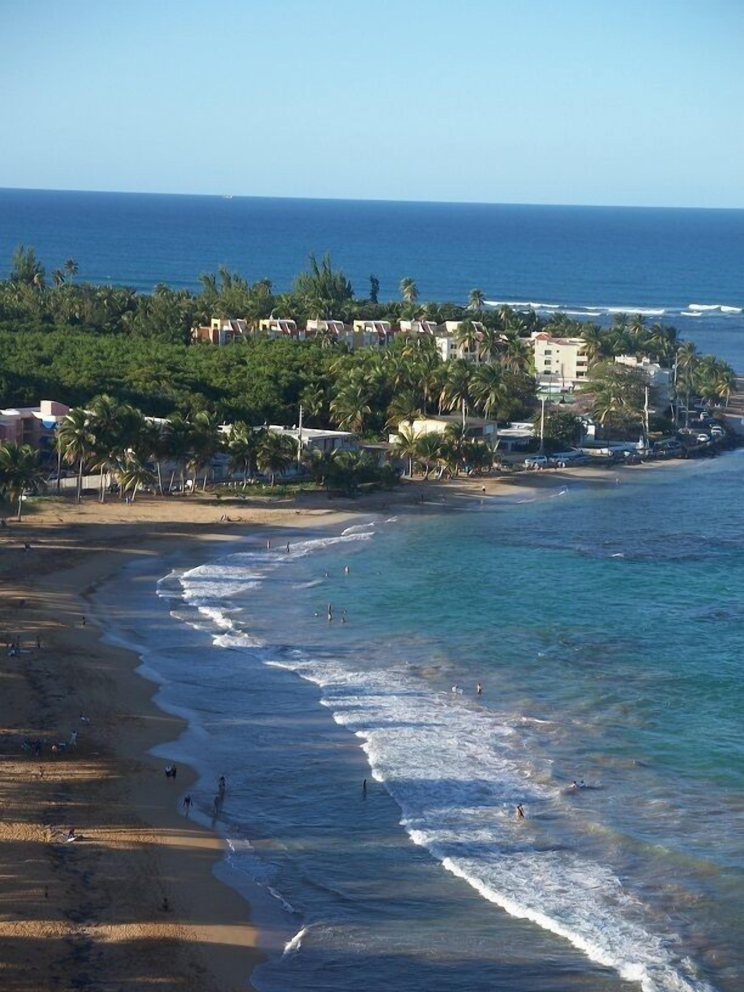 On the beach, sun loungers, beach towels