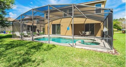Belle maison de 6 chambres, à 6 miles de Disney World, piscine orientée sud
