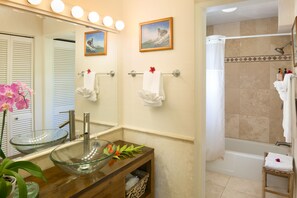 Combined shower/bathtub, hair dryer, towels, soap - Best Oceanfront - Walls of windows on famous surf and sunset, 2BR/2BA, A/C (Koloa)