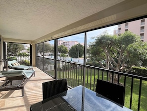 Outdoor dining - 2BR, 2BA Marco Island condo with heated pool and walk-to-beach location. (Marco Island)
