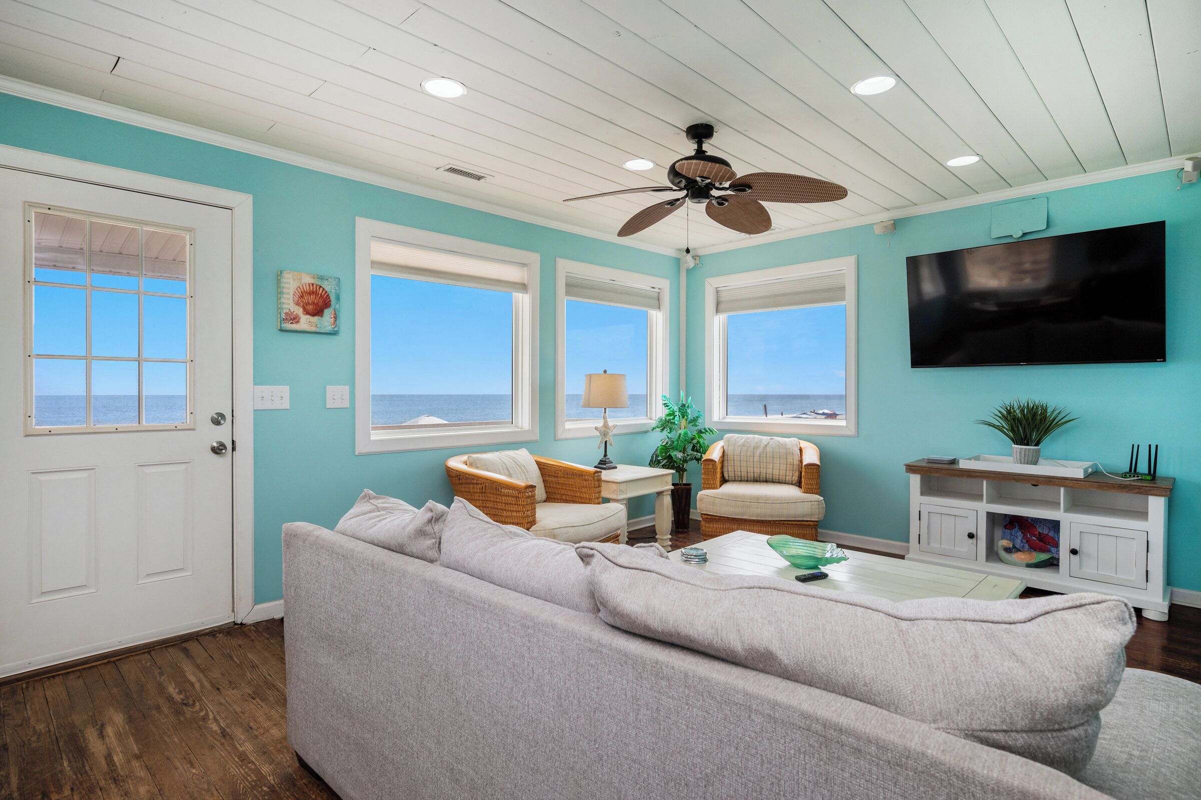 Diamond in the Rough: Oceanfront home with surround sound and hardwood floors.