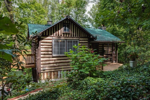 Old World Swiss Cabin Nestled In Woods Ancient Lore & Neyland Stadium Close by