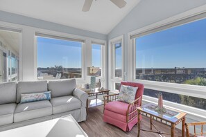 Flat-screen TV, DVD player, books