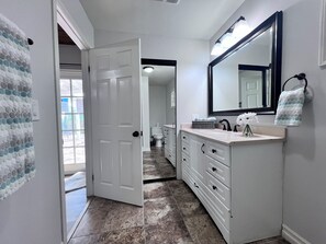 Bathtub, hair dryer, towels