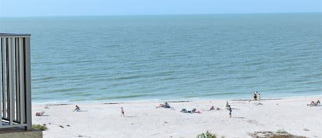 On the beach, sun loungers, beach towels