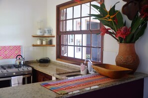 House, 2 Bedrooms | Shared kitchen | Fridge, microwave, oven, stovetop - Charming House With Stunning Views (Paraty)