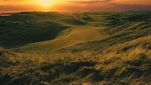A landscape with rolling hills and a path leading through the terrain. - Talbot Hotel (Belmullet)