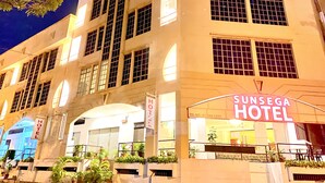 A multi-story hotel with a prominent 'Sunsega Hotel' sign. - Sunsega Hotel (Perai)