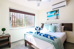 Departamento | 1 habitación, tabla de planchar con plancha y ropa de cama 