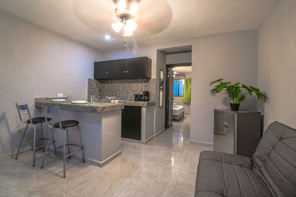 Apartment | Private kitchen | Fridge, microwave, stovetop, coffee/tea maker
