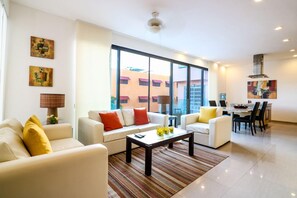 Apartment | Living area | Flat-screen TV - Apartment Habita 202 (Playa del Carmen)