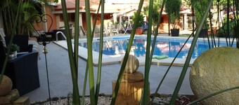 SUITES Y APARTAMENTOS MERLYN AEROPUERTO # 31, OASIS DE PAZ
