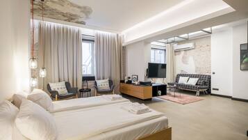 Deluxe Studio | Premium bedding, blackout curtains, iron/ironing board, free WiFi