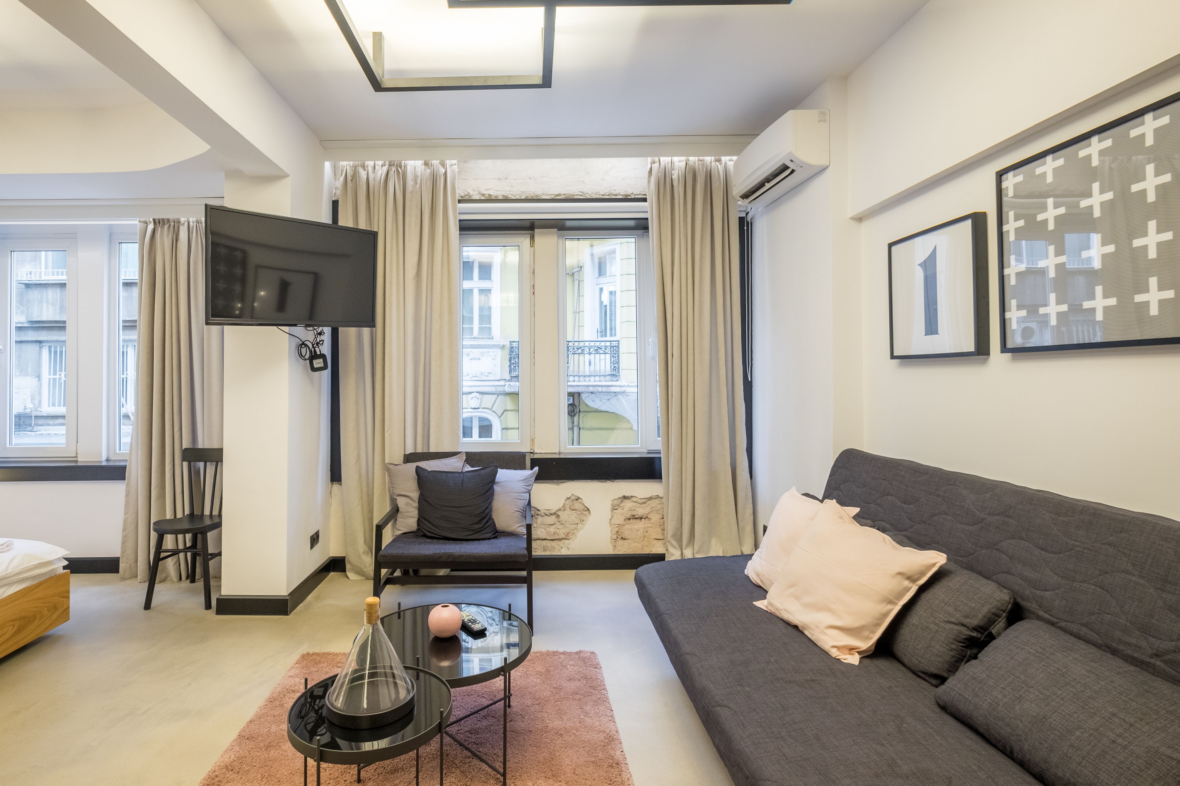 superior studio | living area | plasma tv