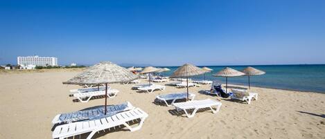 Private beach, sun loungers, beach umbrellas