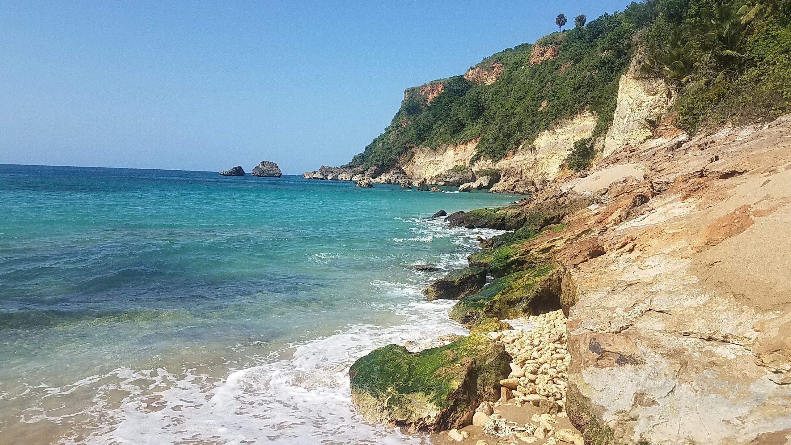 On the beach, sun loungers, beach towels