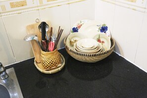 Fridge, microwave, cookware/dishes/utensils