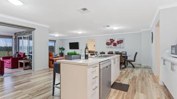 Bulla Lodge | Private kitchen | Full-size fridge, microwave, oven, stovetop