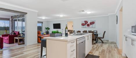 Bulla Lodge | Private kitchen | Full-size fridge, microwave, oven, stovetop