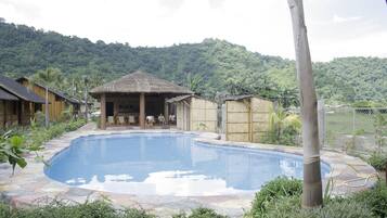 Outdoor pool, open 7:30 AM to 11 PM, sun loungers