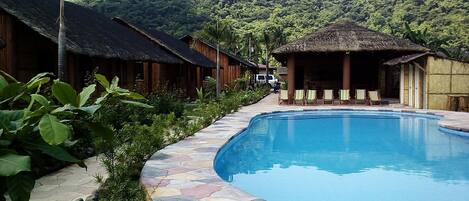 Outdoor pool, open 7:30 AM to 11 PM, pool loungers