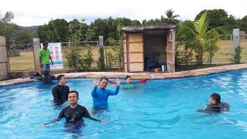 Outdoor pool, open 7:30 AM to 11 PM, pool loungers