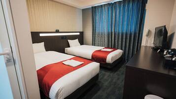 Twin Room, Non Smoking | Down comforters, blackout drapes, soundproofing, free WiFi