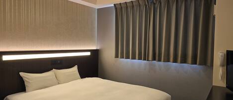 Down comforters, blackout drapes, soundproofing, free WiFi