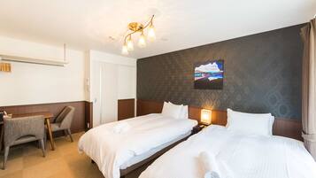 Standard Twin Room | Free minibar, individually decorated, individually furnished, desk