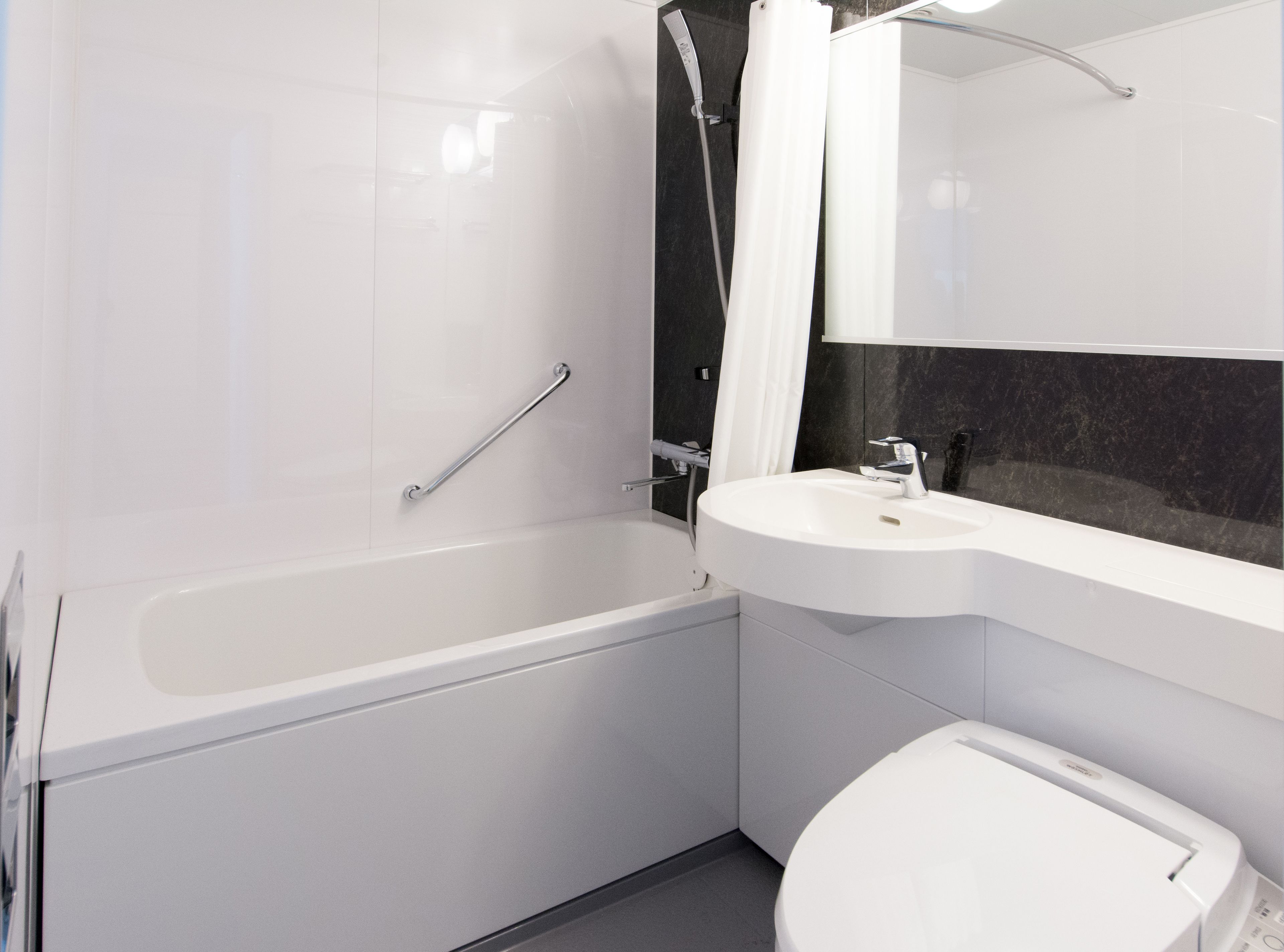 free toiletries, hair dryer, slippers, electronic bidet