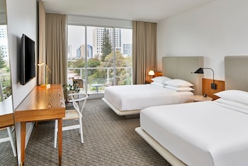 Premium bedding, down comforters, pillowtop beds, minibar at The Sarasota Modern, a Tribute Portfolio Hotel