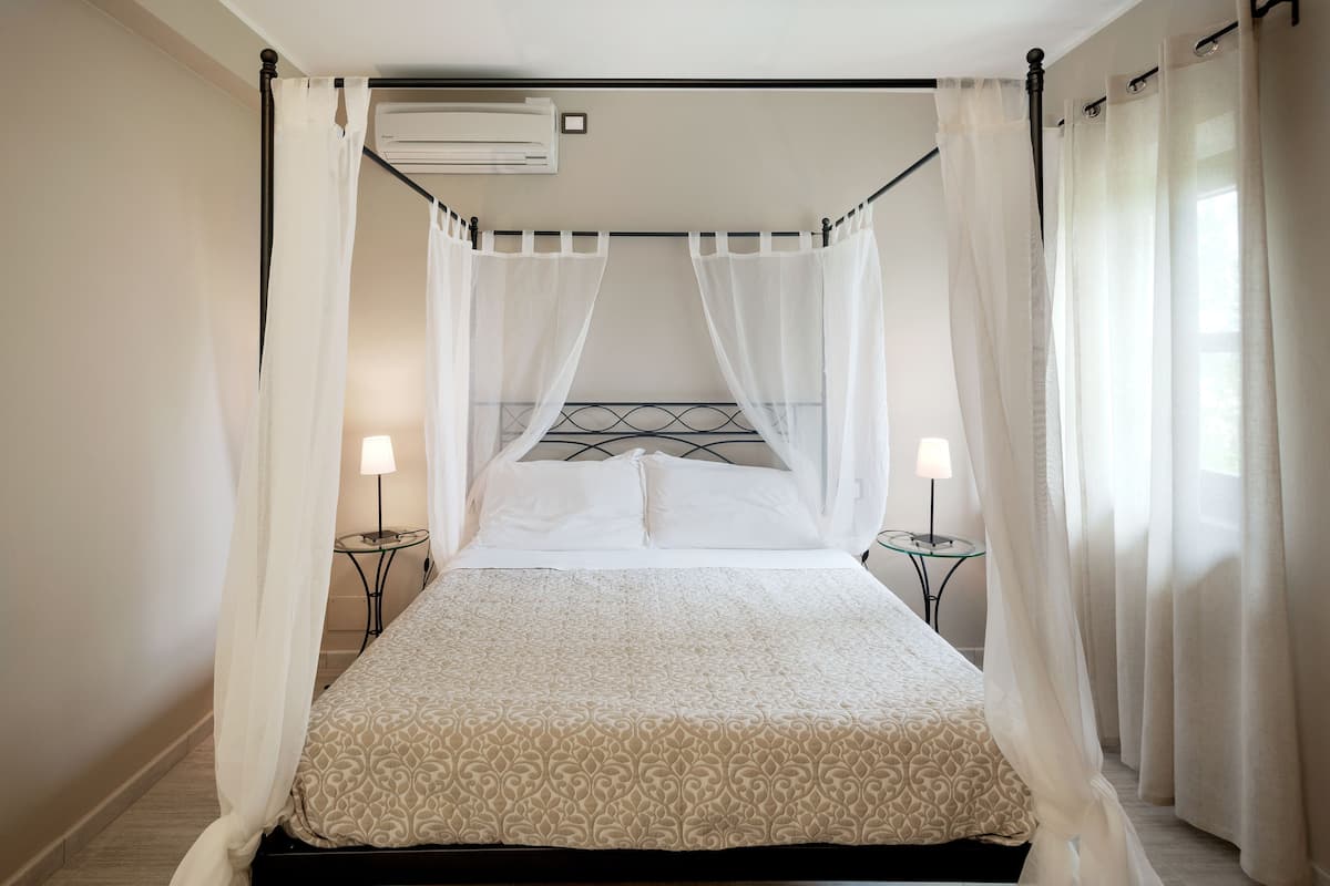 Premium bedding, memory-foam beds, minibar, desk