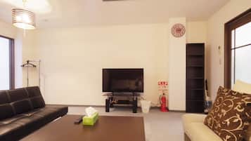 Family Apartment | Living area | Flat-screen TV