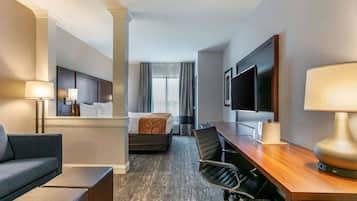 Suite, 1 King Bed, Non Smoking | In-room safe, desk, blackout drapes, iron/ironing board