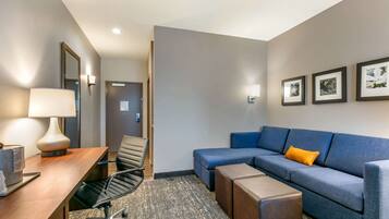 Suite, 1 King Bed, Non Smoking | In-room safe, desk, blackout curtains, iron/ironing board