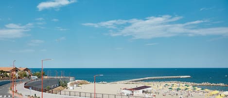 Private beach nearby, 5 beach bars