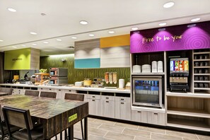 Free daily on-the-go breakfast - Home2 Suites by Hilton Daytona Beach Speedway (Daytona Beach)