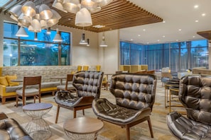 Relax in style with comfortable seating and stunning views of the outdoors.