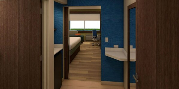 A hotel room with a bed, a desk, a chair, and a window with a view of the outdoors. - Holiday Inn Express Alliance by IHG (Alliance)