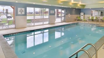 Indoor pool, open 7:00 AM to 10:00 PM, pool loungers
