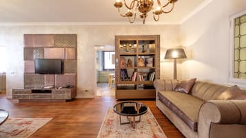 Luxury Apartment | Living area | Flat-screen TV