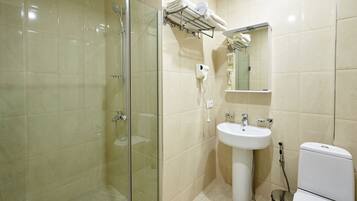 Shower, free toiletries, hair dryer, towels