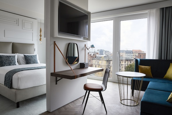 Suite, 1 Queen Bed, City View | 1 bedroom, in-room safe, desk, laptop workspace