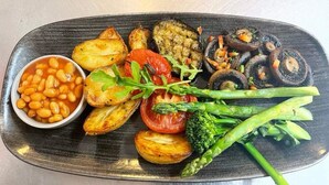 A plate of food with roasted vegetables, beans, and greens. - Borgie Lodge Hotel (Thurso)